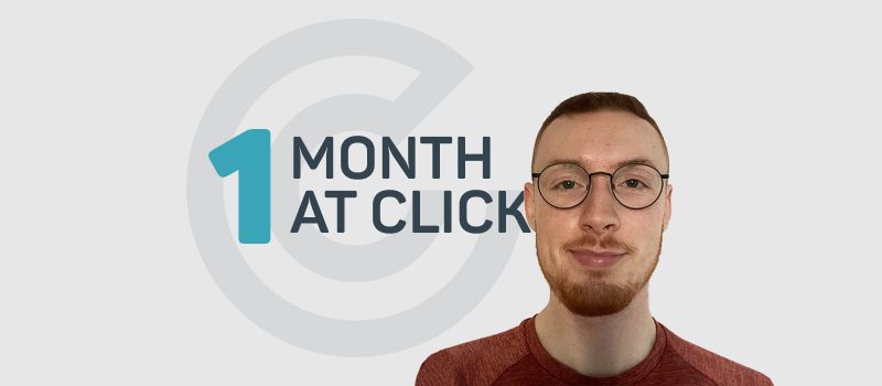 A man - Matty - in front of a Click Consult branded background